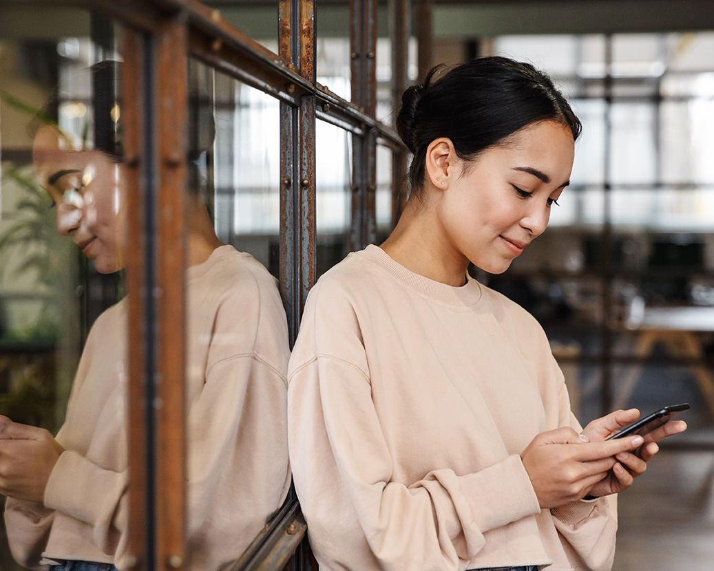 Asian woman with a cell phone