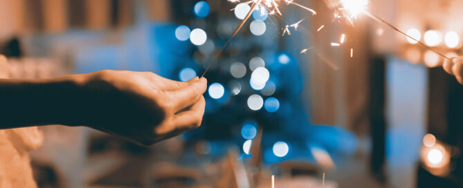 Sparklers over a holiday table; surviving holidays as part of the AAPI community